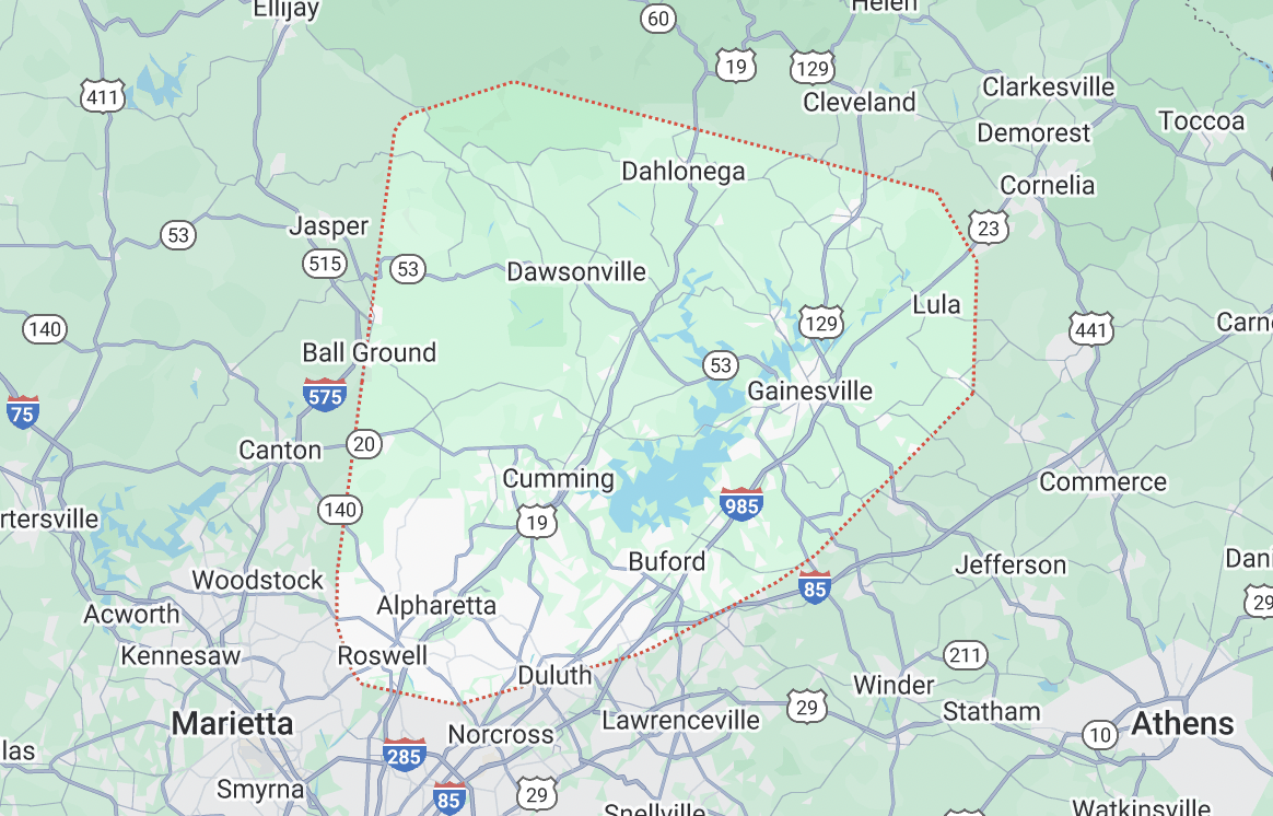 Map showing a section of northeast Georgia, highlighting locations like Dahlonega, Gainesville, Buford, and Cumming, with roads I-85 and Highway 53 marked. Discover local amenities such as pressure washing services along your route for a pristine journey.