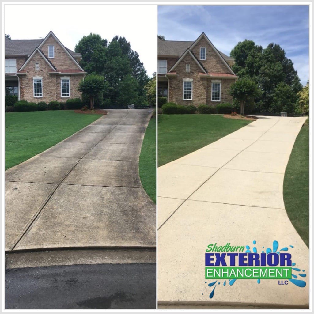 Before-and-after image showing a concrete driveway cleaned; left side is dirty with dark stains, right side is clean and bright. House and lawn are visible in the background.